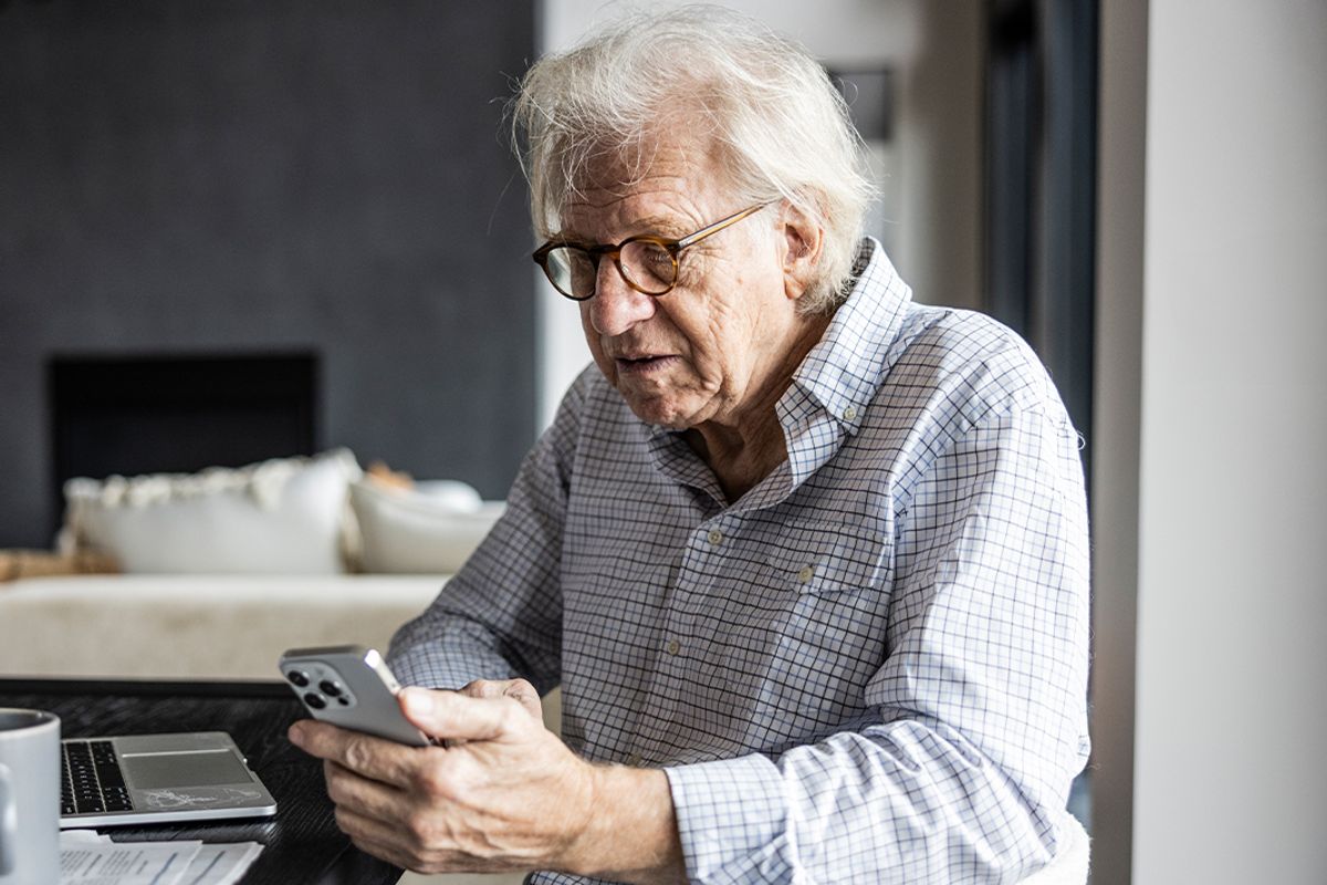 A man checks his finances