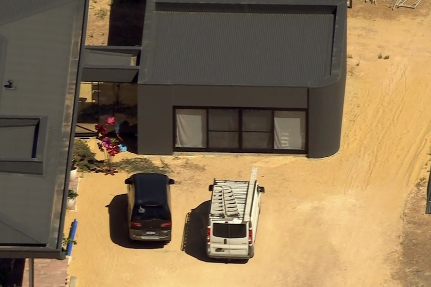 A tight shot of a home under construction on a rural property