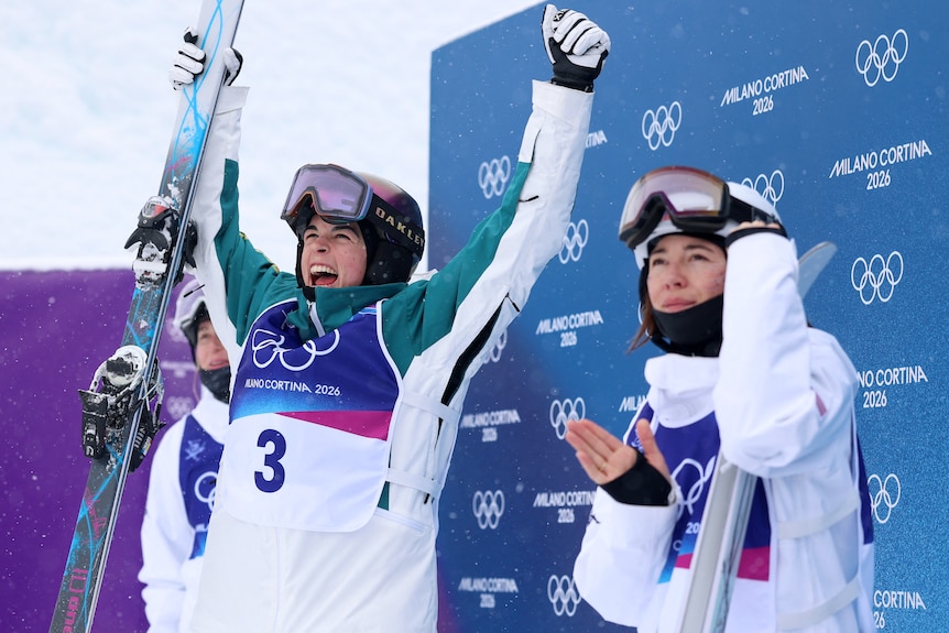 Jakara Anthony celebrates winninf gold at the Winter Olympics.