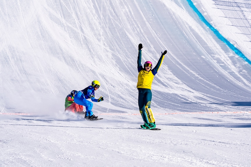 Josie Baff raises her arms