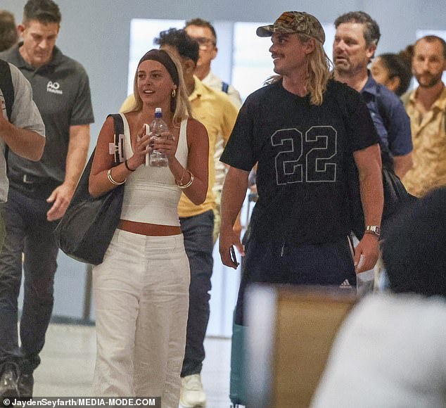 Smith appeared in good spirits - until he noticed our photographer