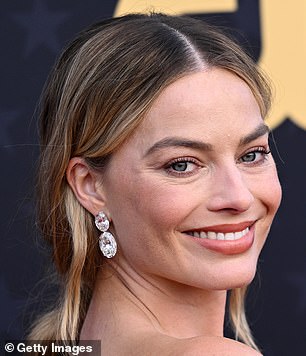 Hollywood gossips can't help but notice just how fresh Margot Robbie is looking as she continues her latest red carpet campaign for Wuthering Heights. (Pictured in January 2024)