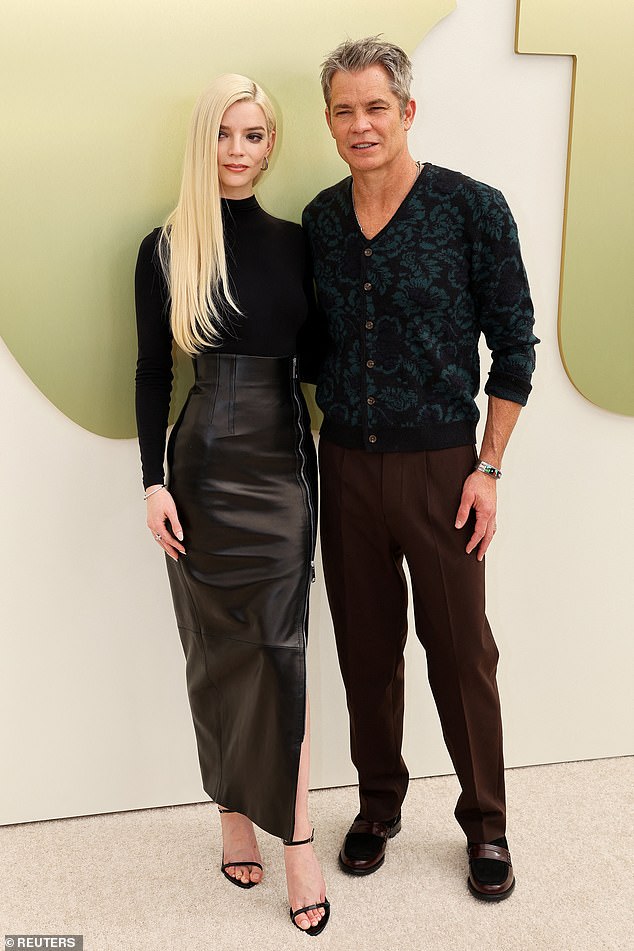 Walking the red carpet at the Barker Hangar, she was joined by her co-star Timothy Olyphant at the event