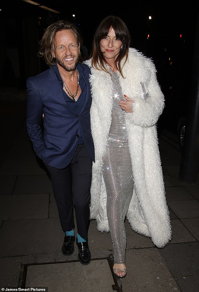 Also in attendance was former Big Brother host Davina, 58, who looked glamorous in a glitzy silver one-shoulder gown as she strolled arm-in-arm with her now-husband Michael Douglas