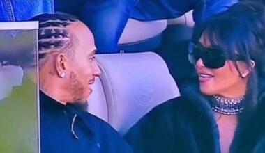 Kim Kardashian and a seemingly besotted Hamilton at the Super Bowl - she in a black faux fur jacket and him with a sparkling diamond earring