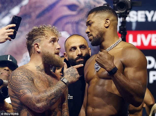 Matchroom's stable includes several of boxing's most commercially established names, including former heavyweight champion Anthony Joshua (right, with Jake Paul)