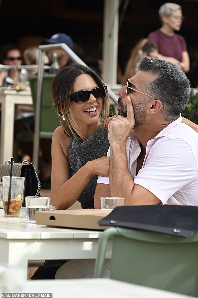 The account manager was all smiles as she got cosy with intruder groom Joel Moses, 31, during lunch at Club Rose Bay with friends