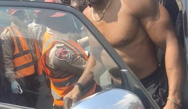 Anthony Joshua leaving the car after the crash which killed two of his friends in Nigeria