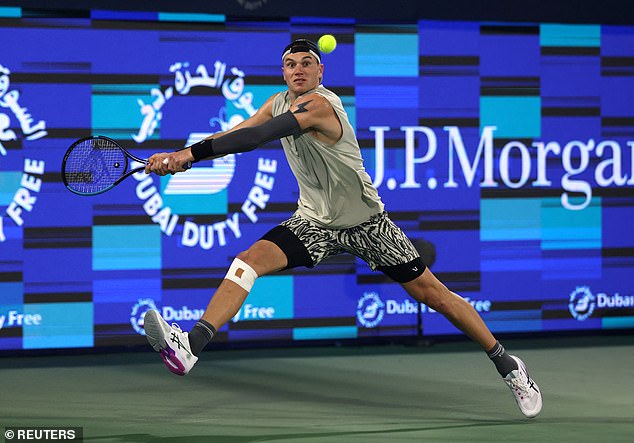 The British player (pictured) was quick to fix the error as he lost his match to Arthur Rinderknech at the Dubai 500 tournament