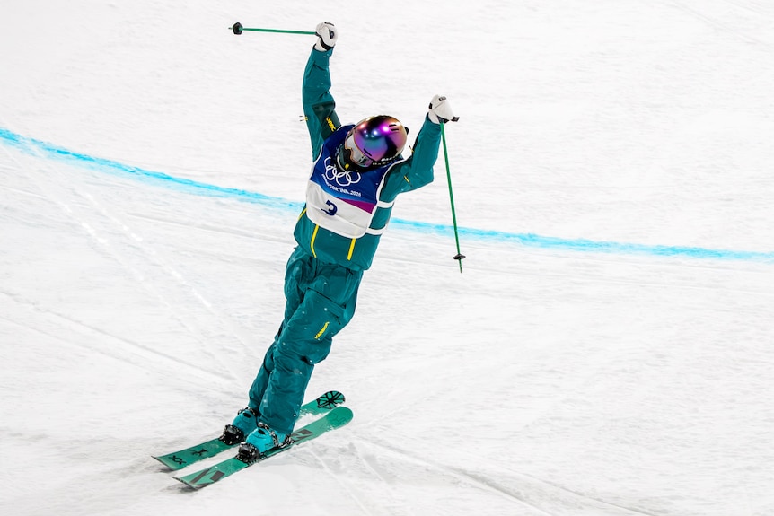 Indra Brown raises her arms