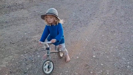 Gus Lamont's parents release video of missing four-year-old riding his balance bike – video