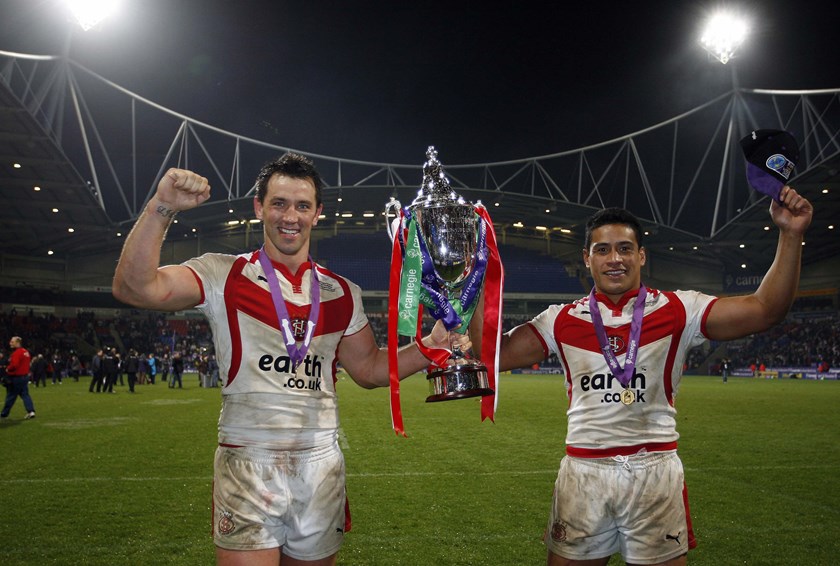 Saints alive: Paul Sculthorpe and Willie Talau enjoy the spoils of victory in 2007.