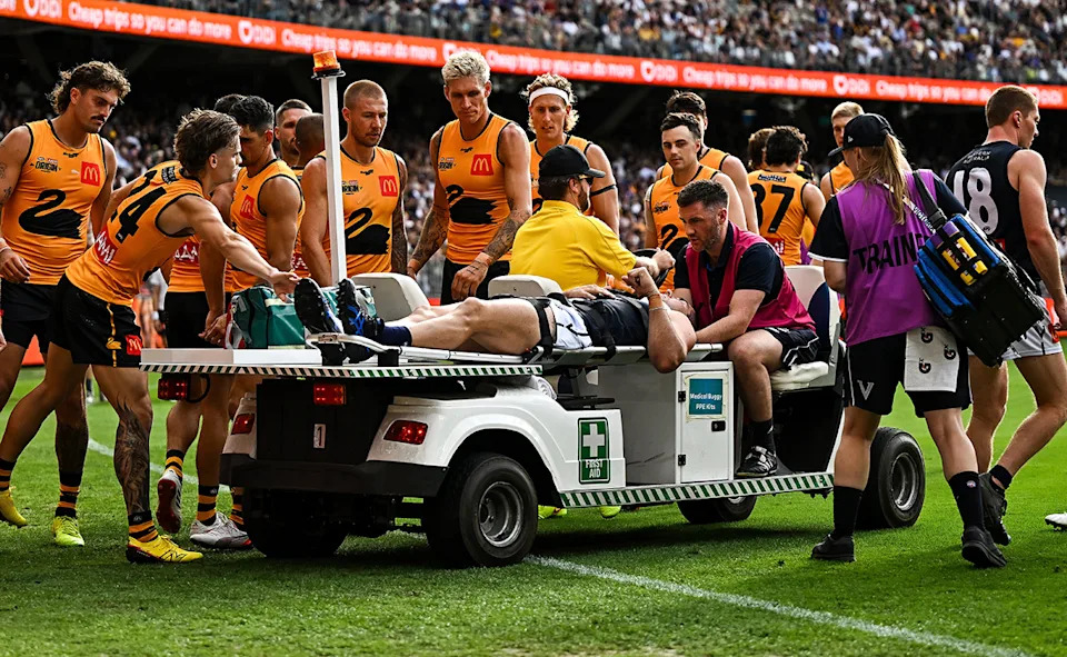 Victoria and Western Australia players, pictured here getting around Jacob Weitering.