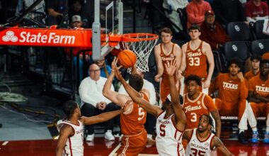 Sean Miller in team huddle during timeout