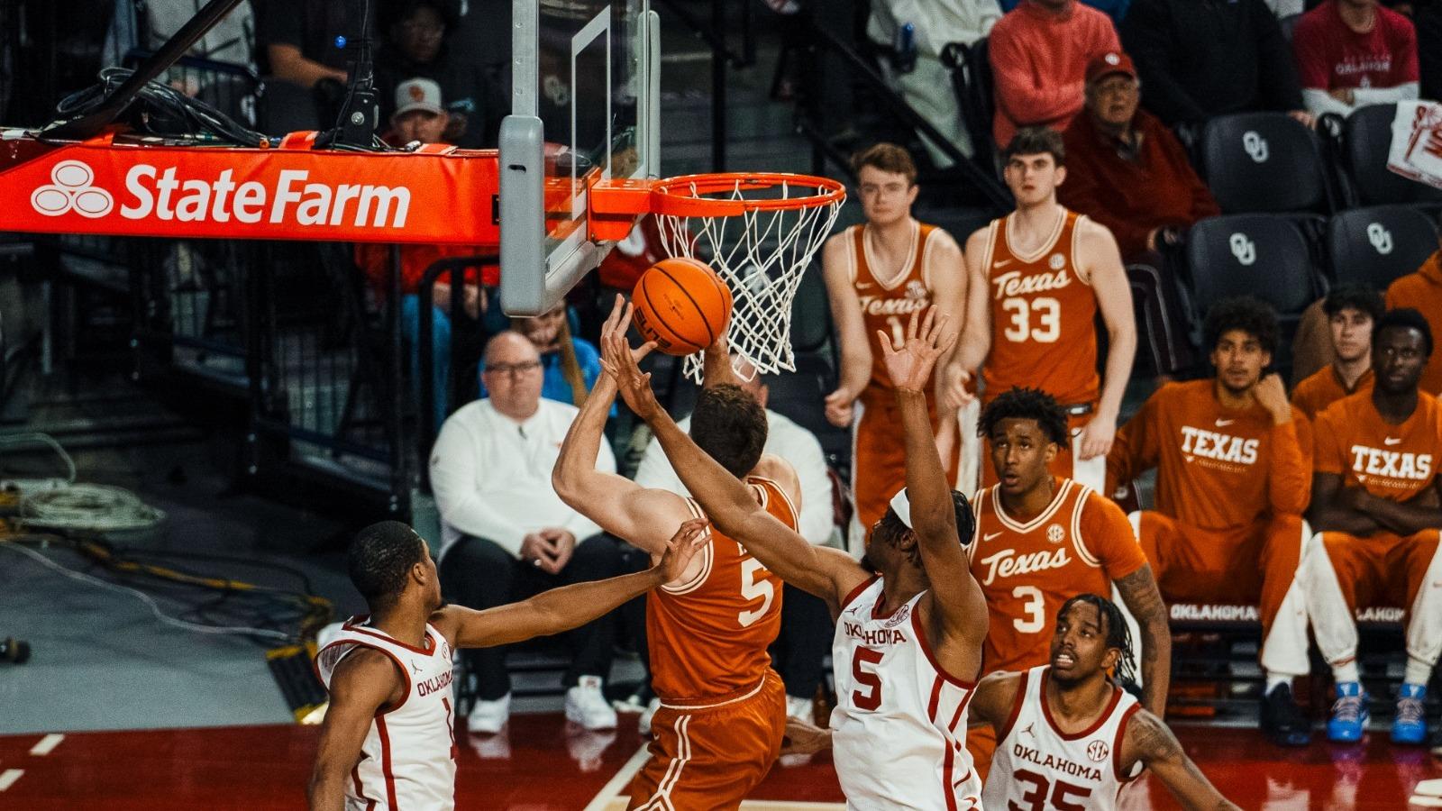 Sean Miller in team huddle during timeout