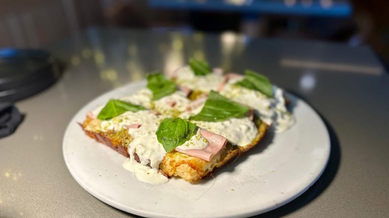 The mortadella-pistachio-stracciatella pizza in all its gluten-free glory at 1653...