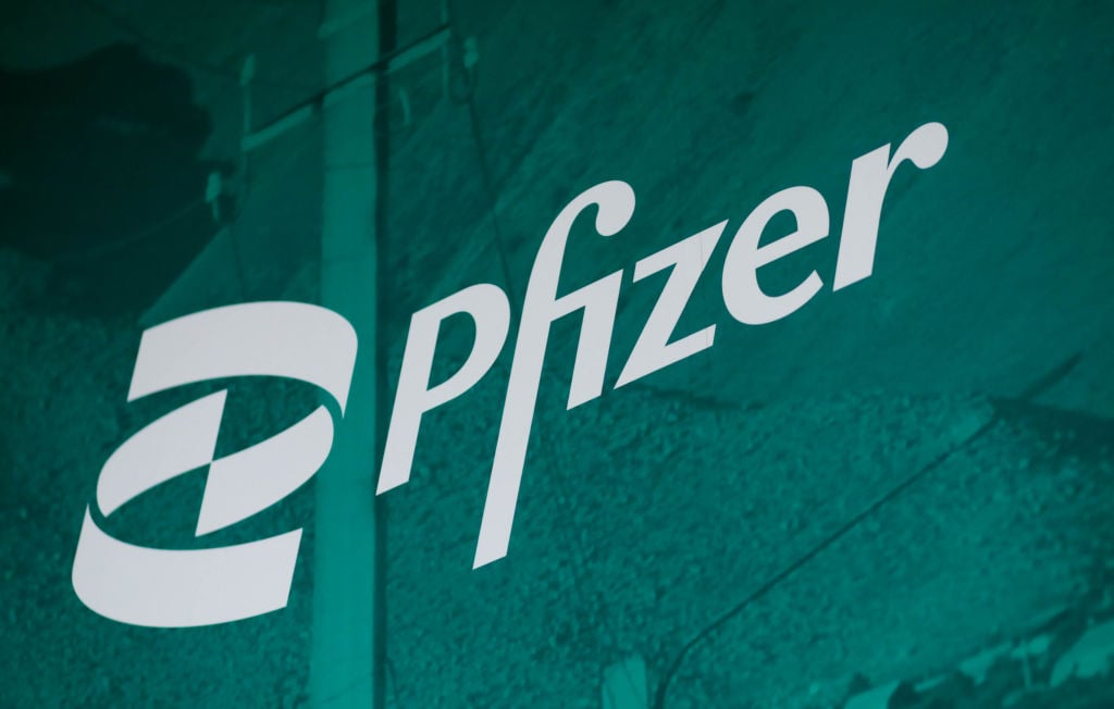 Pfizer name and logo on glass.