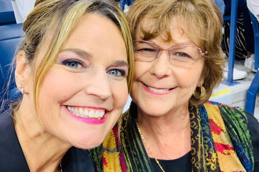 A photo from instagram of savannah guthrie and her mum at a sports game 