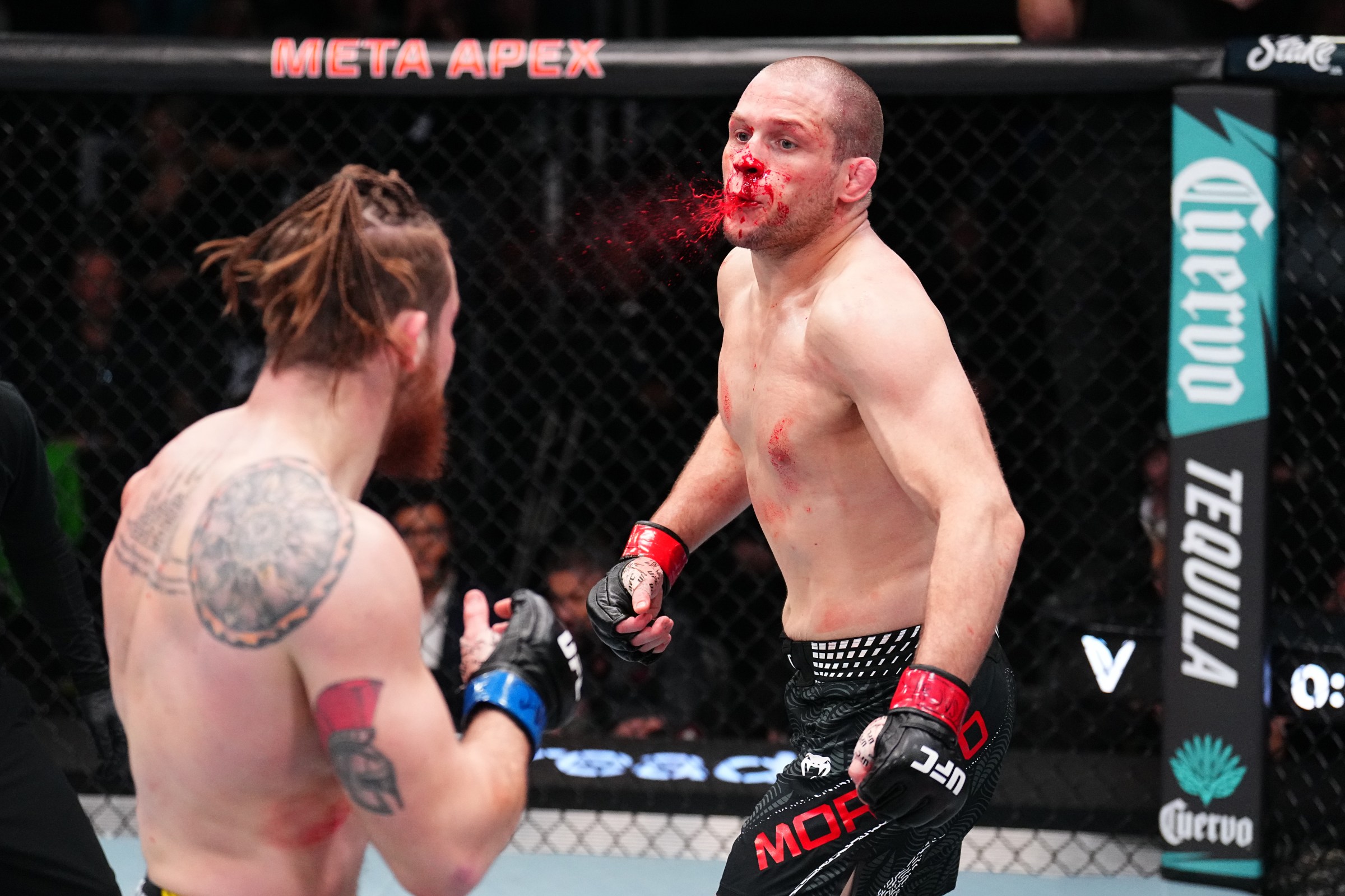 LAS VEGAS, NEVADA - FEBRUARY 07: (R-L) Alex Morono faces Daniil Donchenko of Ukraine in a welterweight fight during the UFC Fight Night event at Meta APEX on February 07, 2026 in Las Vegas, Nevada. (Photo by Chris Unger/Zuffa LLC)