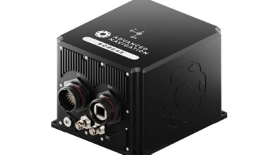 A small black metal box with several wiring and cable connector ports, being part of the Boreas D90-based navigation system