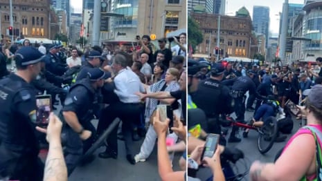 Video shows police repeatedly punching man at Sydney anti-Herzog protests – video