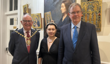 Mayor Dimoldenberg with Dr Irina Bradley and her husband Jerry at the exhibition. ( The large painting behind them is a portrait of Irina.)