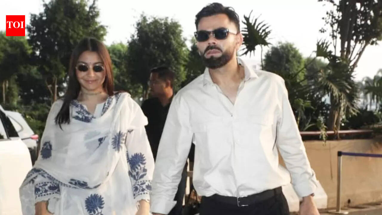 Virat Kohli and Anushka Sharma TWIN in white as they jet out of Mumbai city |