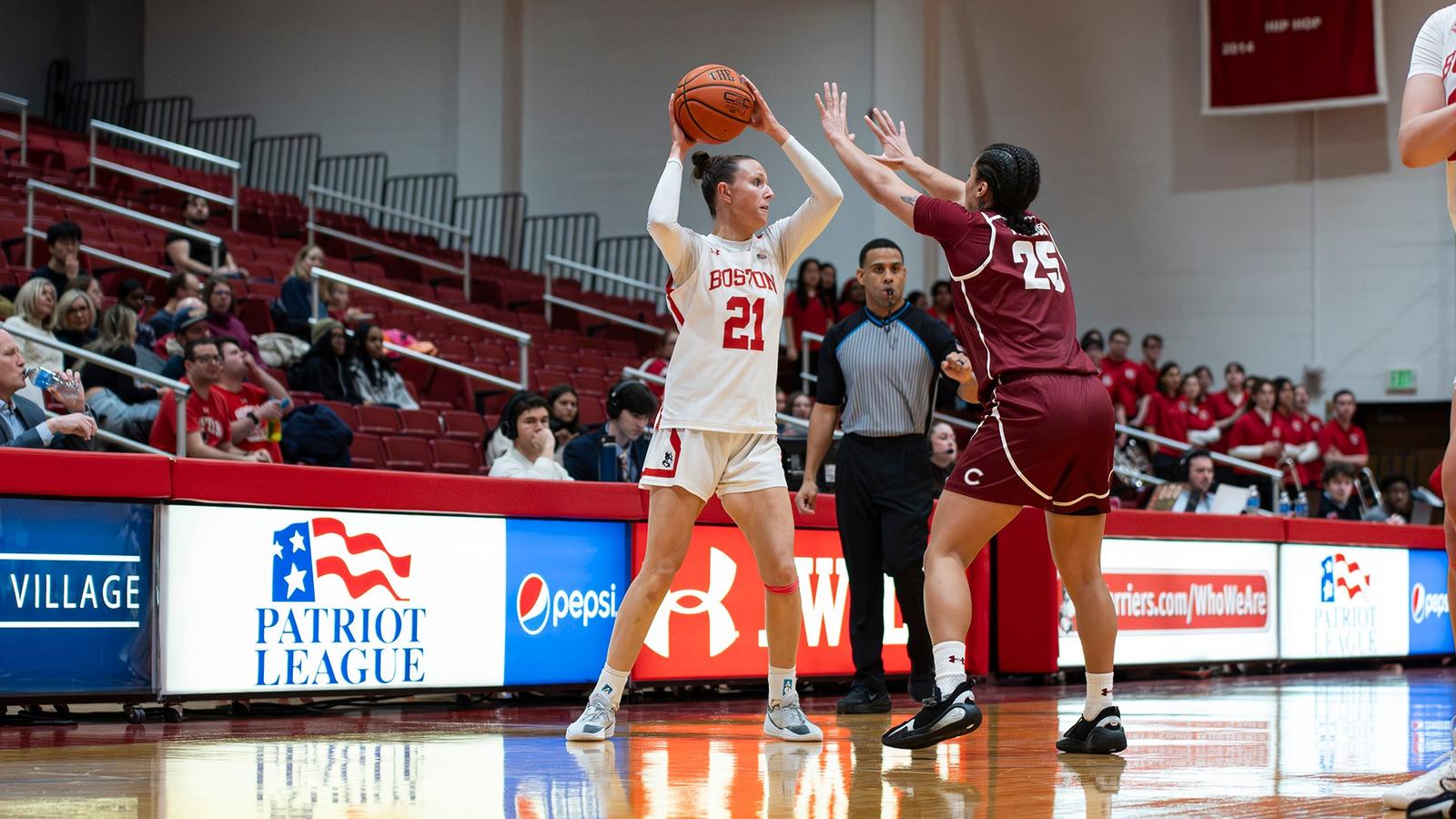 Photo of BU women's basketball senior Anastasiia Semenova shooting a layup at Bucknell.