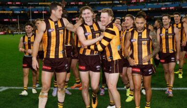 Arch-rivals' bid fails as AFL young gun re-signs with Hawks