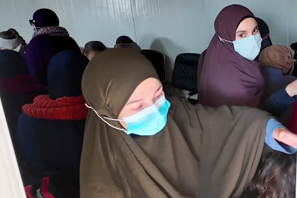 Australian families beginning their journey on Monday, before they were turned back to their camp.