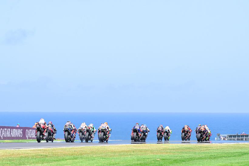 The MotoGP riders storm down into turn one at the picturesque Phillip Island.