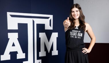 Lucciana Perez volleys against Ohio State at the ITA National Team Indoor Championship in Evanston, Illinois