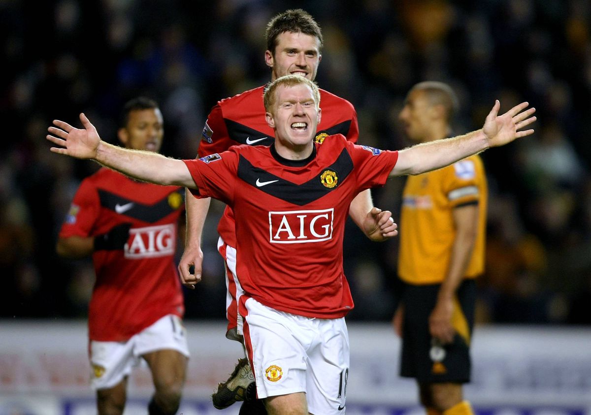 Paul Scholes of Manchester United celebrates scoring his team's first goal and his 100th Premier League goal during the FA Barclays Premier League match between Wolverhampton Wanderers and Manchester United at Molineux on March 6 2010 in Wolverhampton, England. 