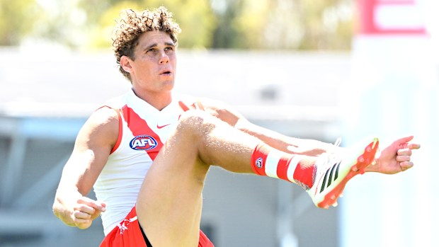 Charlie Curnow kicks a goal in his first Swans action.