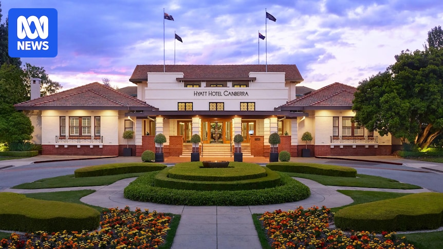 Navy chief's speech disrupted, bomb squad called after rocks thrown through glass door at Canberra hotel