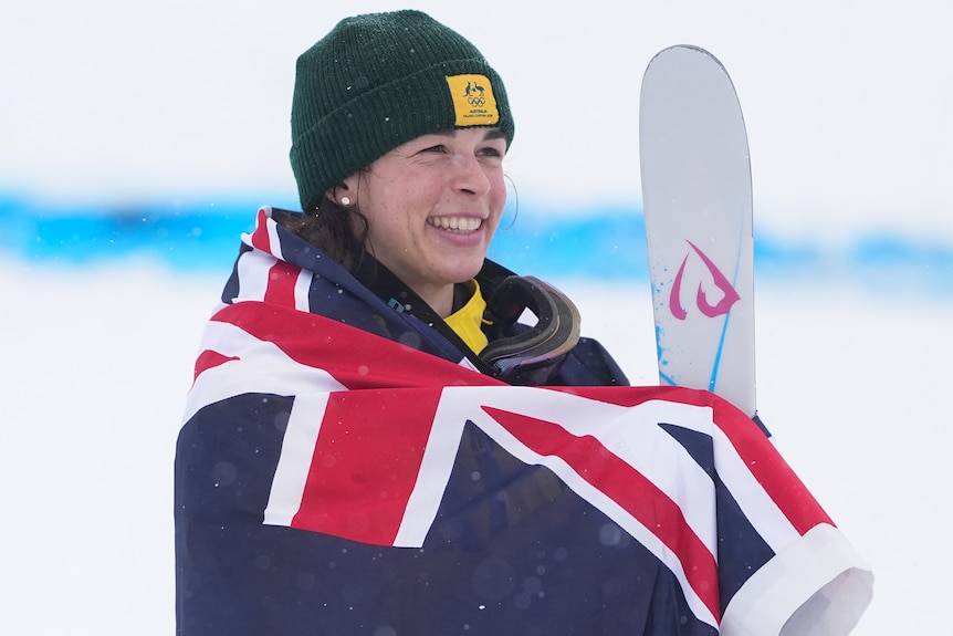 Jakara Anthony wrapped up in the Australian flag.