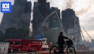 Hong Kong offers buy-out scheme for owners who lost homes in last year's deadly apartment fire