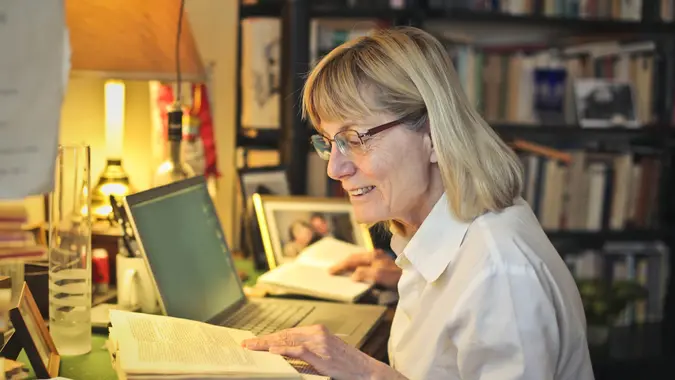 Woman is working at home.