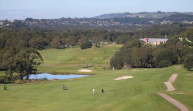 a group of people on a golf course