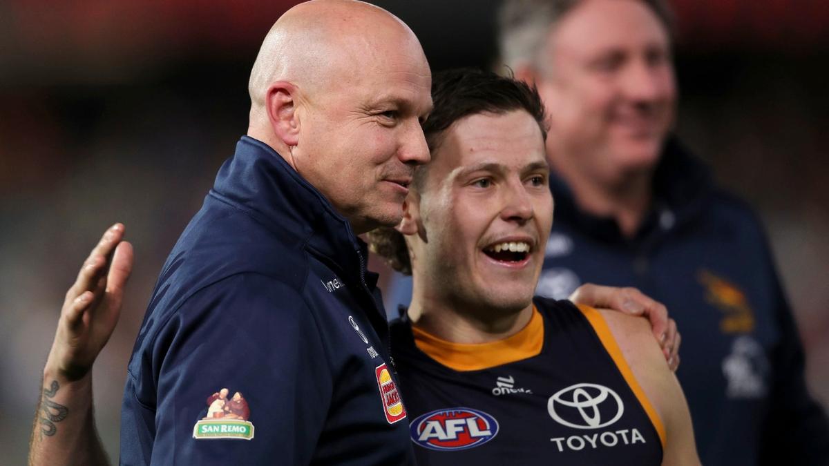 Taylor Walker rallies around AFL young gun Jake Soligo after operation to correct irregular heartbeat