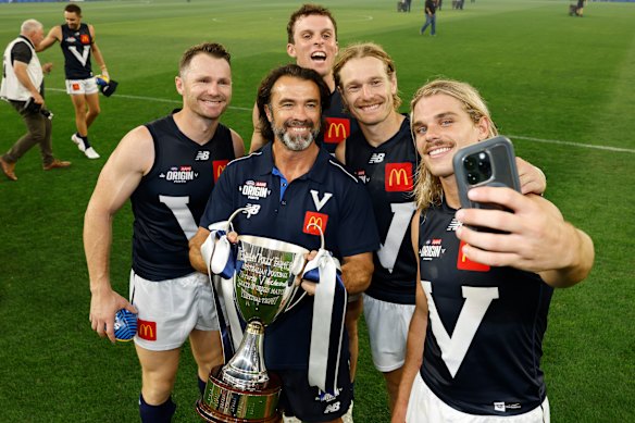 Victorian coach Chris Scott with his Geelong/Victorian players, Patrick Dangerfield, Max Holmes, Tom Stewart and Bailey Smith.