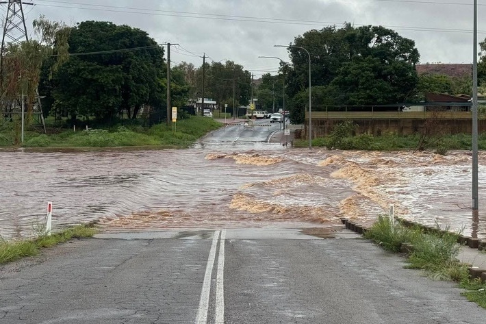 A road flooded over by a river