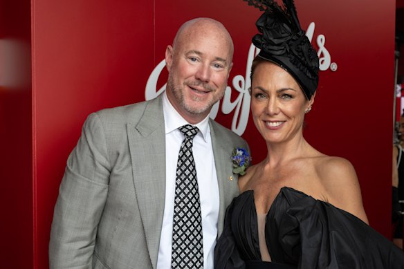 Luke and Cate Sayers at Derby Day in Melbourne two years ago, shortly before the lewd photo scandal erupted.