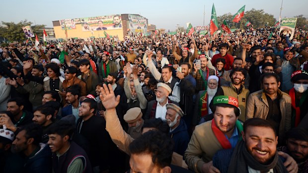 Supporters of imprisoned former Prime Minister Imran Khan protest in Peshawar, Pakistan on December 07, 2025. Chief Minister of Khyber Pakhtunkhwa Sohail Afridi addressed a large crowd at a PTI gathering, calling for Khan's immediate release and urging unity as the party continues its campaign against what it describes as political injustice. (Photo by Hussain Ali/Anadolu via Getty Images)