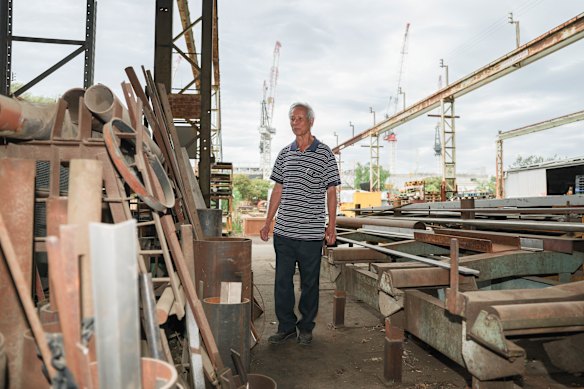 Thanh Thai in his metalworks business, as cranes work away on building the NextDC data centre in West Footscray.