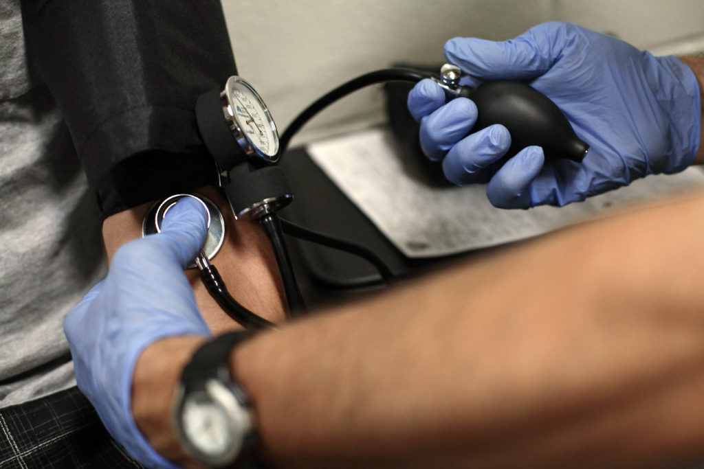Drug Recognition Expert Instructor checks inmate for drug use at the Maricopa County Fourth Avenue Jail in Phoenix