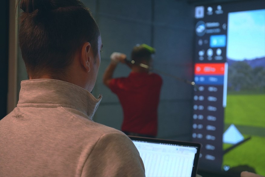 Ross Tugwood, Data Analyst, collects information from Neil Wain during Today's Golfer's 2026 club testing