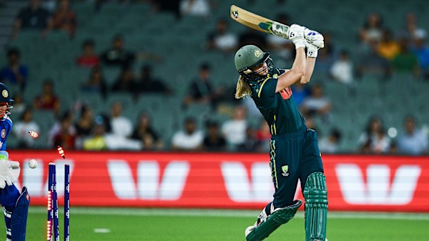 Australia's Ellyse Perry is bowled by India's Shreyanka Patil during game three of the Women's T20 International Series at Adelaide Oval.