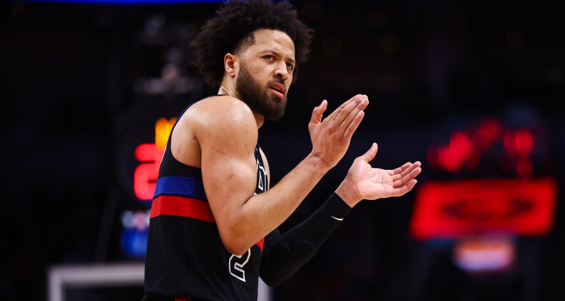 Cade Cunningham claps his hands