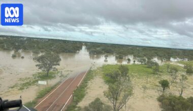 Central Australia tropical low expected to linger for days as flooding cuts off towns